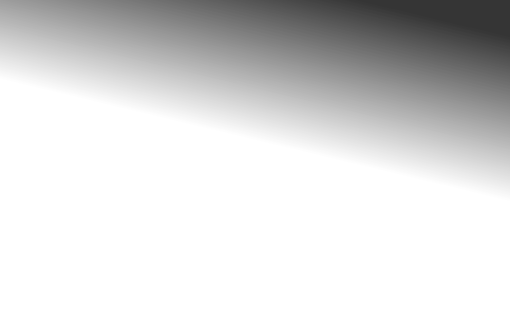 A man and woman standing in front of a wall with a wreath on it. Description generated by AI