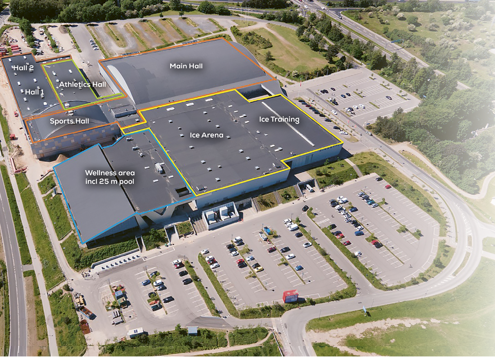 A large parking lot with a building in the background. Description generated by AI