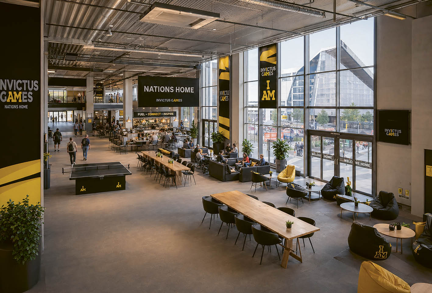 A large room with a yellow and black sign. Description generated by AI